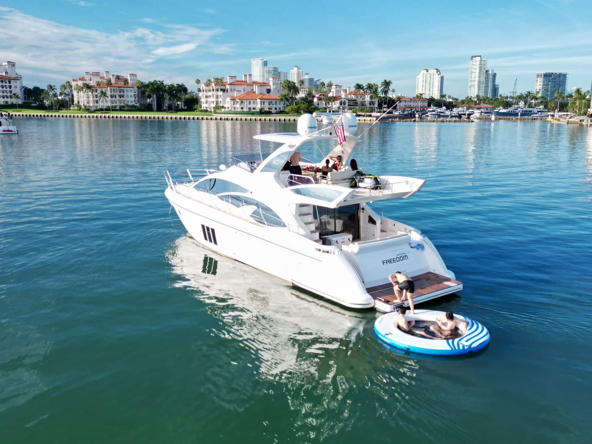 Aerial view of 60 ft Azimut Freedom yacht off Star Island Miami