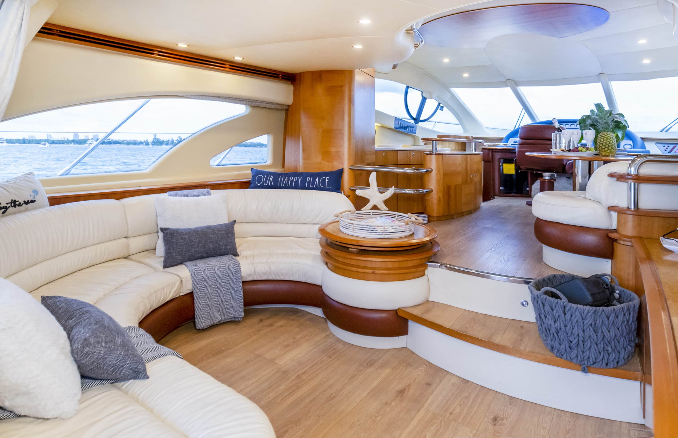 Outdoor dining setup on deck of 57 ft Azimut Thales yacht Miami