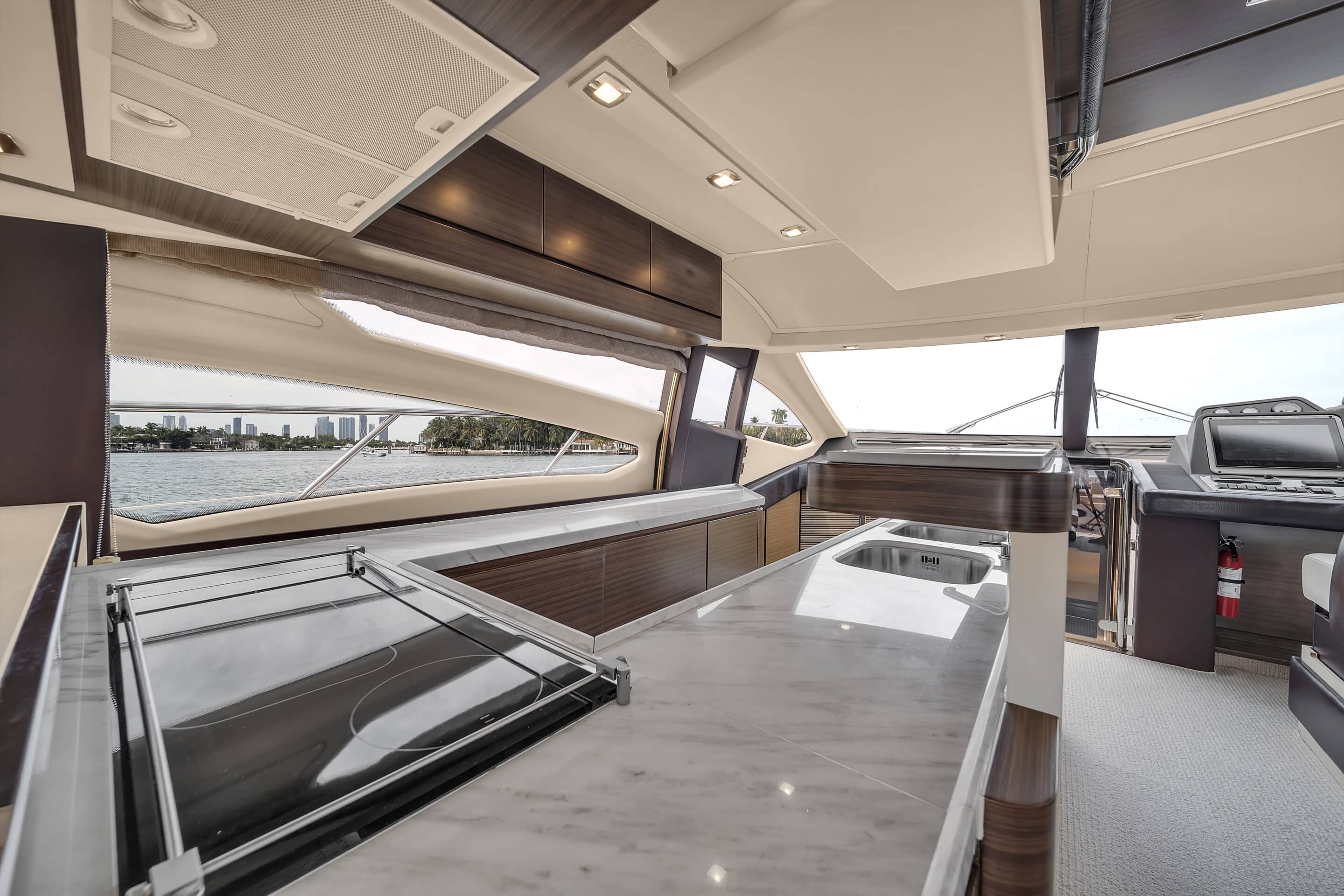 Galley and dining area inside 64 ft Azimut Deon yacht