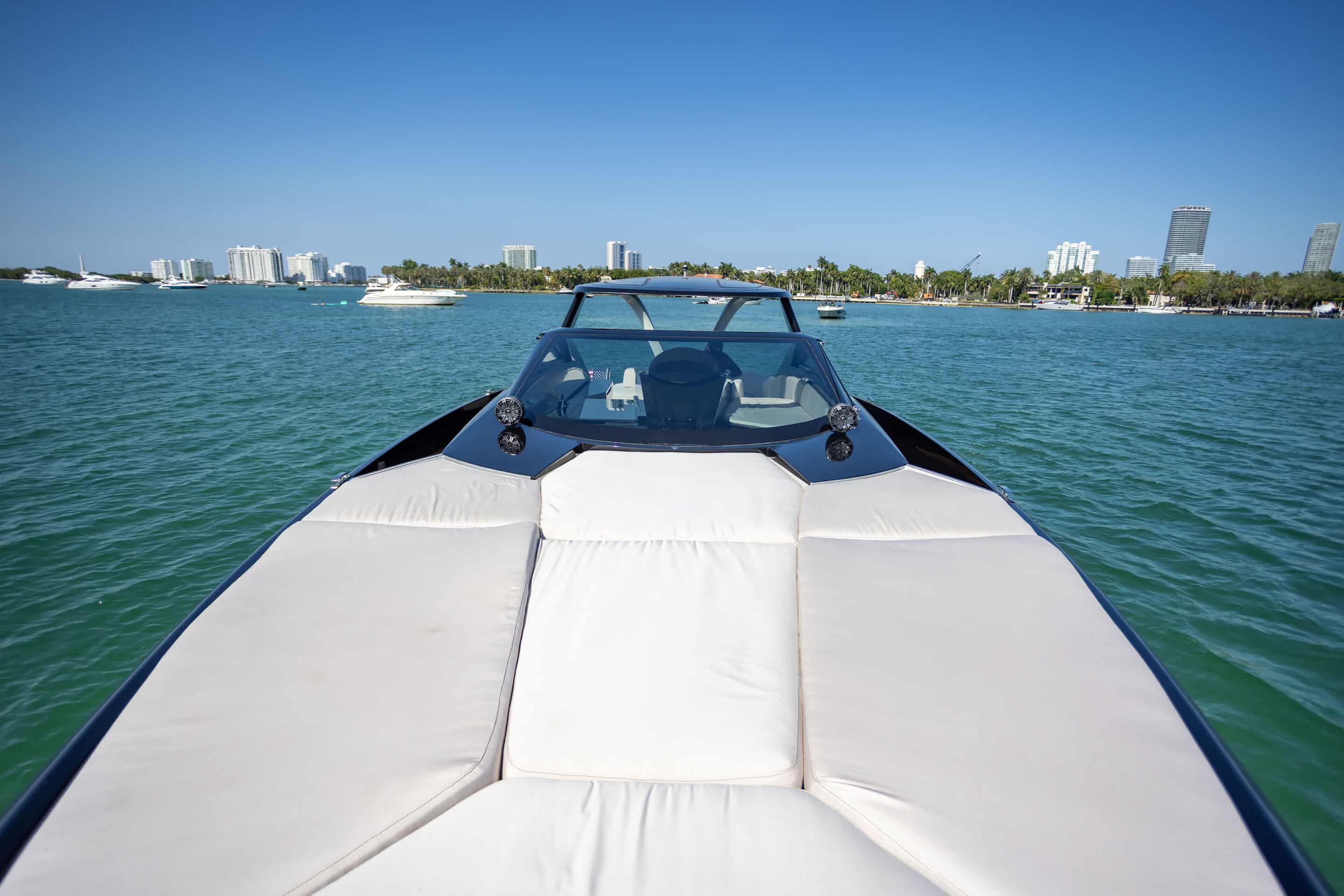 Bow sun pads on 55 ft Tecnomar Evo charter Miami