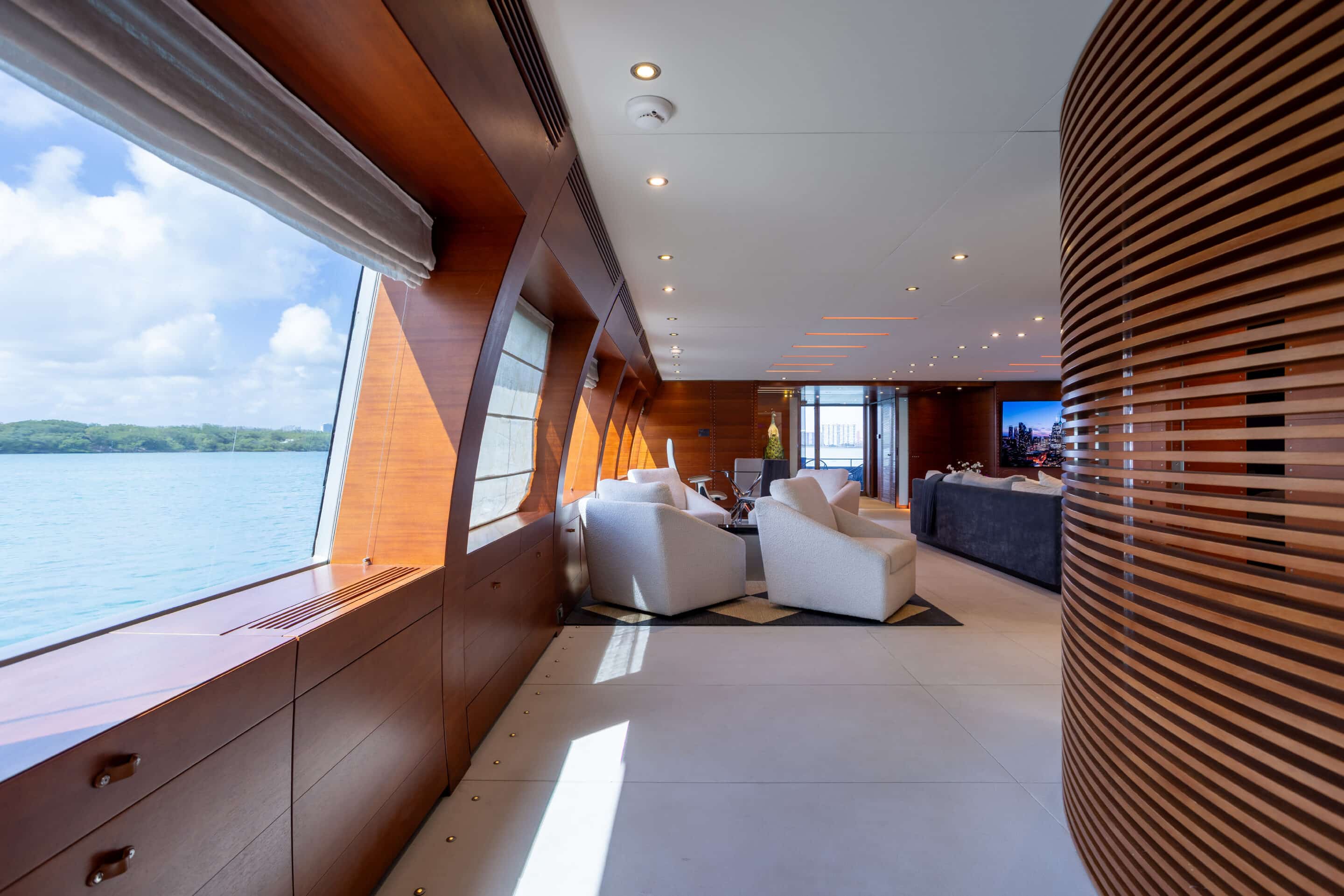 Outdoor dining setup on deck of 135 ft Baglietto Matrix yacht Miami
