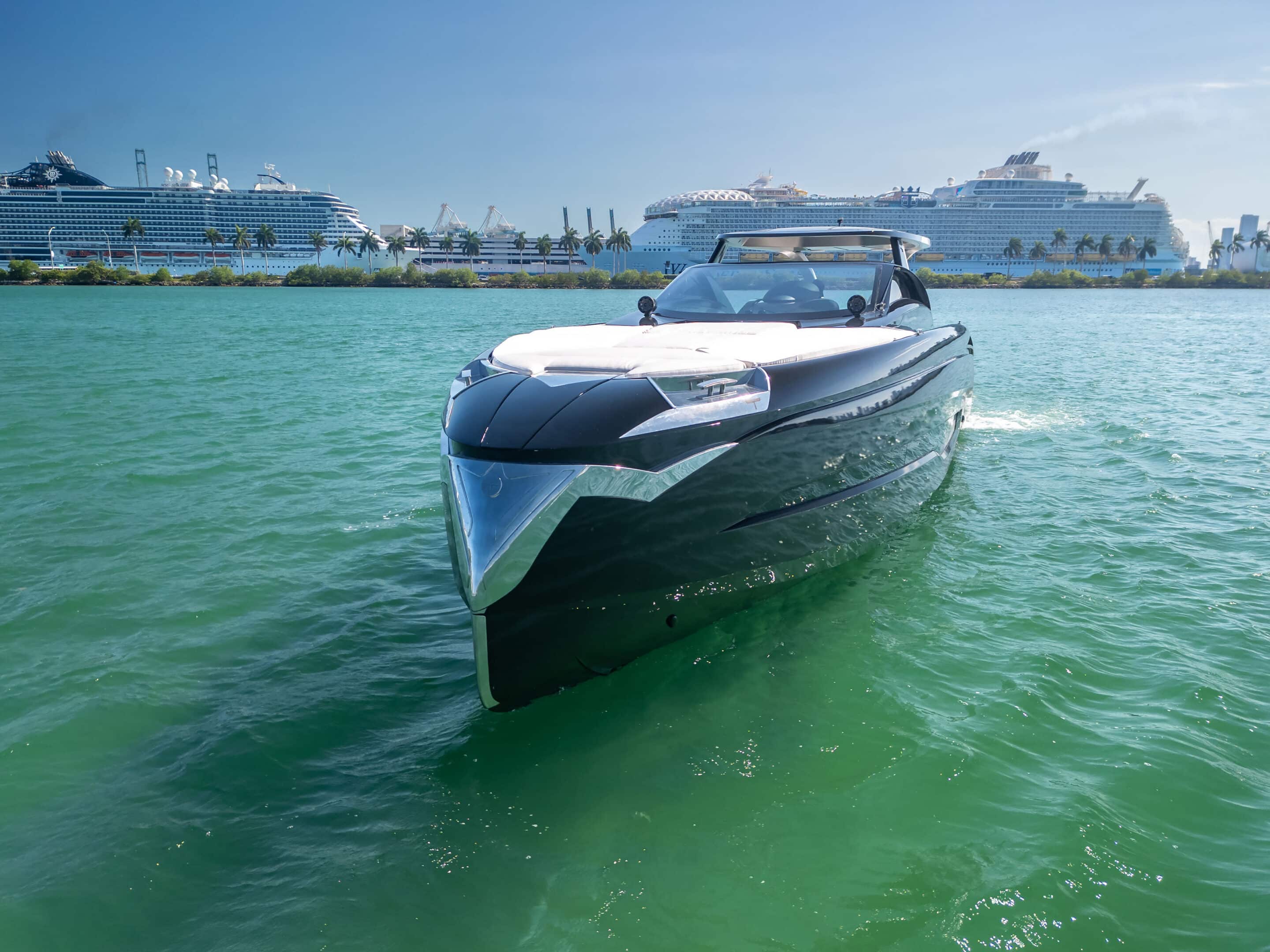 Bow of 55 ft Tecnomar Evo yacht with Miami skyline view